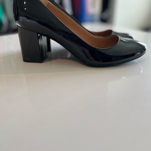 Black square heel pumps